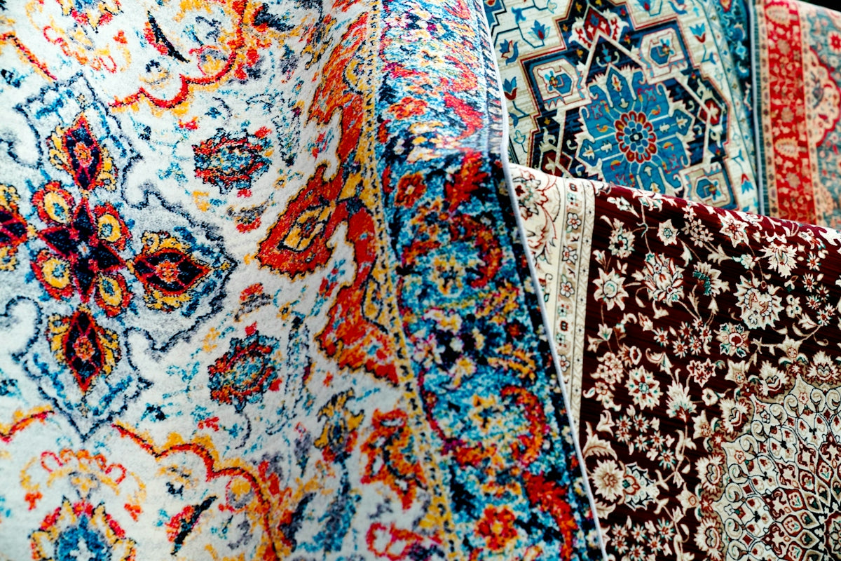 Colorful patterned rugs are on display