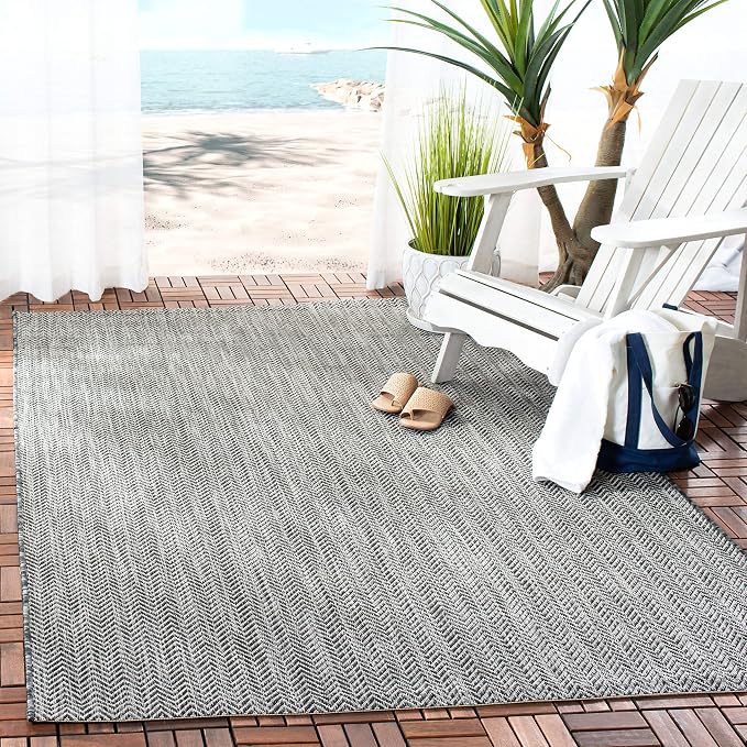 SAFAVIEH Outdoor Accent Rug 4'x5'7" by Unknown