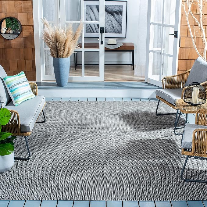 SAFAVIEH Outdoor Accent Rug 2'7"x5' by Unknown