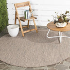 SAFAVIEH Outdoor Round Rug 5'3" by Unknown