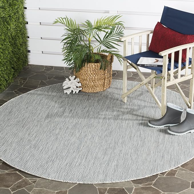 SAFAVIEH Outdoor Round Rug 9' by Unknown